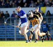 20 November 2022; Ethan Twomey of St Finbarr’s in action against Pearse Lillis of Ballyea during the AIB Munster GAA Hurling Senior Club Championship Semi-Final match between Ballyea and St Finbarr's at Cusack Park in Ennis, Clare. Photo by Daire Brennan/Sportsfile