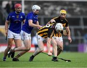 20 November 2022; Brandon O’Connell of Ballyea in action against Padraig Buggy of St Finbarr’s during the AIB Munster GAA Hurling Senior Club Championship Semi-Final match between Ballyea and St Finbarr's at Cusack Park in Ennis, Clare. Photo by Daire Brennan/Sportsfile