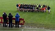 20 November 2022; The Ballyea squad sit for the traditional pre match photograph before the AIB Munster GAA Hurling Senior Club Championship Semi-Final match between Ballyea and St Finbarr's at Cusack Park in Ennis, Clare. Photo by Daire Brennan/Sportsfile