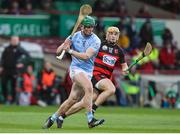 20 November 2022; Mike Foley of Na Piarsaigh in action against Peter Hogan of Ballygunner during the AIB Munster GAA Hurling Senior Club Championship Semi-Final match between Na Piarsaigh and Ballygunner at TUS Gaelic Grounds in Limerick. Photo by Michael P Ryan/Sportsfile