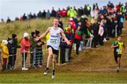 20 November 2022; Gearoid Tuohy of Sligo AC, Sligo, celebrates on his way to winning the Boys U14 3000m during the 123.ie Senior and Even Age Cross County Championships at Rosapenna Golf Course in Rosapenna, Donegal. Photo by Ben McShane/Sportsfile
