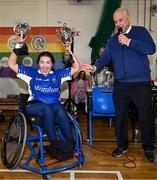 20 November 2022; Munster captain Ellie Sheehy lifting the cups after the M.Donnelly GAA Wheelchair Hurling / Camogie All-Ireland Finals 2022 at Ashbourne Community School in Ashbourne, Meath. Photo by Eóin Noonan/Sportsfile