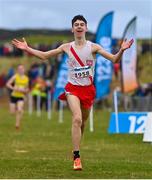 20 November 2022; Caolan McFadden of Cranford AC, Donegal, celebrates on his way to winning in the Boys U16 4000m during the 123.ie Senior and Even Age Cross County Championships at Rosapenna Golf Course in Rosapenna, Donegal. Photo by Ben McShane/Sportsfile