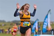 20 November 2022; Anika Thompson of Leevale AC, Cork, celebrates on her way to winning the Girls U18 4000m during the 123.ie Senior and Even Age Cross County Championships at Rosapenna Golf Course in Rosapenna, Donegal. Photo by Ben McShane/Sportsfile