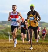 20 November 2022; Thomas McStay of Galway City Harriers AC, Galway, left, and Eskander Turki of Annadale Striders AC, Antrim, competing in the Senior Men's 10,000m during the 123.ie Senior and Even Age Cross County Championships at Rosapenna Golf Course in Rosapenna, Donegal. Photo by Ben McShane/Sportsfile