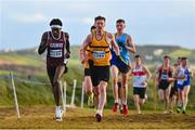20 November 2022; Abaas adam Edris of Castlegar AC, Galway, left, and John Shine of Leevale AC, Cork, competing in the Senior Men's 10,000m during the 123.ie Senior and Even Age Cross County Championships at Rosapenna Golf Course in Rosapenna, Donegal. Photo by Ben McShane/Sportsfile