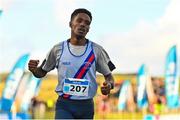 20 November 2022; Hiko Haso Tonosa of Dundrum South Dublin AC, Dublin, celebrates after finishing second in the Senior Men's 10,000m during the 123.ie Senior and Even Age Cross County Championships at Rosapenna Golf Course in Rosapenna, Donegal. Photo by Ben McShane/Sportsfile