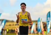 20 November 2022; Darragh McElhinney of U.C.D. AC, Dublin, celebrates after winning the Senior Men's 10,000m during the 123.ie Senior and Even Age Cross County Championships at Rosapenna Golf Course in Rosapenna, Donegal. Photo by Ben McShane/Sportsfile