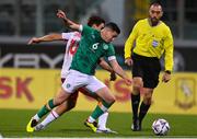 20 November 2022; Josh Cullen of Republic of Ireland in action against Alexander Satariano of Malta during the International Friendly match between Malta and Republic of Ireland at the Ta' Qali National Stadium in Attard, Malta. Photo by Seb Daly/Sportsfile