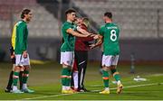 20 November 2022; Republic of Ireland players, from left, Jeff Hendrick, Callum O'Dowda and Alan Browne during a substitution during the International Friendly match between Malta and Republic of Ireland at the Ta' Qali National Stadium in Attard, Malta. Photo by Seb Daly/Sportsfile