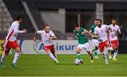 20 November 2022; Josh Cullen of Republic of Ireland in action against Malta players Ryan Camenzuli, left, and Enrico Pepe during the International Friendly match between Malta and Republic of Ireland at the Ta' Qali National Stadium in Attard, Malta. Photo by Seb Daly/Sportsfile