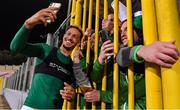 20 November 2022; Callum Robinson of Republic of Ireland takes a selfie with supporters after his side's victory in the International Friendly match between Malta and Republic of Ireland at the Ta' Qali National Stadium in Attard, Malta. Photo by Seb Daly/Sportsfile
