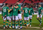 20 November 2022; Callum Robinson of Republic of Ireland, 7, is congratulated by team-mate Nathan Collins after scoring his side's first goal during the International Friendly match between Malta and Republic of Ireland at the Ta' Qali National Stadium in Attard, Malta. Photo by Seb Daly/Sportsfile
