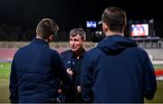 20 November 2022; Republic of Ireland manager Stephen Kenny is interviewed by FAI communications manager Kieran Crowley, left, and FAI videographer Matthew Turnbull before the International Friendly match between Malta and Republic of Ireland at the Ta' Qali National Stadium in Attard, Malta. Photo by Seb Daly/Sportsfile