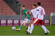 20 November 2022; Josh Cullen of Republic of Ireland in action against Matthew Guillaumier of Malta during the International Friendly match between Malta and Republic of Ireland at the Ta' Qali National Stadium in Attard, Malta. Photo by Seb Daly/Sportsfile