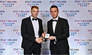 19 November 2022; Rory Gaffney of Shamrock Rovers, left, is presented with his PFA Ireland Premier Division Team of the Year Medal by PFA Ireland Chairperson Brendan Clarke during the PFA Ireland Awards 2022 at the Marker Hotel in Dublin. Photo by Sam Barnes/Sportsfile