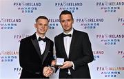 19 November 2022; Andy Lyons of Shamrock Rovers, left, is presented with his PFA Ireland Premier Division Team of the Year Medal by PFA Ireland Chairperson Brendan Clarke during the PFA Ireland Awards 2022 at the Marker Hotel in Dublin. Photo by Sam Barnes/Sportsfile