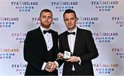 19 November 2022; Mark Connolly of Derry City, left, is presented with his PFA Ireland Premier Division Team of the Year Medal by PFA Ireland Chairperson Brendan Clarke during the PFA Ireland Awards 2022 at the Marker Hotel in Dublin. Photo by Sam Barnes/Sportsfile