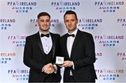 19 November 2022; Brian Maher of Derry City, left, is presented with his PFA Ireland Premier Division Team of the Year Medal by PFA Ireland Chairperson Brendan Clarke during the PFA Ireland Awards 2022 at the Marker Hotel in Dublin. Photo by Sam Barnes/Sportsfile