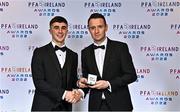 19 November 2022; Barry Coffey of Cork City, left, is presented with his PFA Ireland First Division Team of the Year Medal by PFA Ireland Chairperson Brendan Clarke during the PFA Ireland Awards 2022 at the Marker Hotel in Dublin. Photo by Sam Barnes/Sportsfile