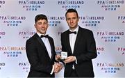 19 November 2022; Dylan Barnett of Longford Town, left, is presented with his PFA Ireland First Division Team of the Year Medal by PFA Ireland Chairperson Brendan Clarke during the PFA Ireland Awards 2022 at the Marker Hotel in Dublin. Photo by Sam Barnes/Sportsfile