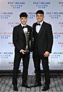 19 November 2022; Phoenix Patterson of Waterford, left, with his brother Kane and his PFA Ireland First Division Player of the Year award during the PFA Ireland Awards 2022 at the Marker Hotel in Dublin. Photo by Sam Barnes/Sportsfile