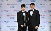 19 November 2022; Phoenix Patterson of Waterford, left, with his brother Kane and his PFA Ireland First Division Player of the Year award during the PFA Ireland Awards 2022 at the Marker Hotel in Dublin. Photo by Sam Barnes/Sportsfile