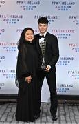 19 November 2022; Phoenix Patterson of Waterford with his mother Paula and his PFA Ireland First Division Player of the Year award during the PFA Ireland Awards 2022 at the Marker Hotel in Dublin. Photo by Sam Barnes/Sportsfile