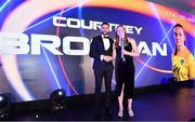 19 November 2022; Courtney Brosnan of Everton and Republic of Ireland  is presented with her PFA Ireland International Women's Player of the Year Award by Roberto Lopes of Shamrock Rovers during the PFA Ireland Awards 2022 at the Marker Hotel in Dublin. Photo by Sam Barnes/Sportsfile