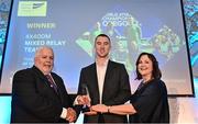 23 November 2022; Jack Raftery, centre, collects the Team of Year Award on behalf of the 4x400m Mixed Relay Team from Athletics Ireland President John Cronin, left, and RSA Insurance Managing Director Elaine Robinson during the 123.ie National Athletics Awards at the Crowne Plaza Hotel in Santry, Dublin. A full list of winners from the event can be found at AthleticsIreland.ie. Photo by Sam Barnes/Sportsfile