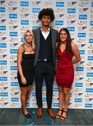 23 November 2022; Reece Ademola, with Lucy-May Sleeman, left, and Nicola Tuthill during the 123.ie National Athletics Awards at the Crowne Plaza Hotel in Santry, Dublin. A full list of winners from the event can be found at AthleticsIreland.ie. Photo by David Fitzgerald/Sportsfile