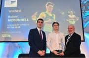 23 November 2022; University Athlete of the Year Robert McDonnell is presented with his award by Minister of State for Sport and the Gaeltacht, Jack Chambers TD, left, and University Athletics representative Cyril Smyth right, during the 123.ie National Athletics Awards at the Crowne Plaza Hotel in Santry, Dublin. A full list of winners from the event can be found at AthleticsIreland.ie. Photo by Sam Barnes/Sportsfile