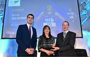 23 November 2022; Master Athlete of the Year Anne Gilshanan, centre, is presented with her award by Minister of State for Sport and the Gaeltacht, Jack Chambers TD, left, and President of the Irish Masters Athletics Association Michael Fennell right, during the 123.ie National Athletics Awards at the Crowne Plaza Hotel in Santry, Dublin. A full list of winners from the event can be found at AthleticsIreland.ie. Photo by Sam Barnes/Sportsfile