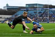 26 November 2022; Dave Kearney of Leinster dives over to score his side's first try despite the tackle of Kyle Steyn of Glasgow Warriors during the United Rugby Championship match between Leinster and Glasgow Warriors at RDS Arena in Dublin. Photo by Ramsey Cardy/Sportsfile