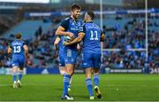 26 November 2022; Dave Kearney of Leinster celebrates with teammate Ross Byrne, left, after scoring his side's first try during the United Rugby Championship match between Leinster and Glasgow Warriors at RDS Arena in Dublin. Photo by Ramsey Cardy/Sportsfile