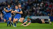 26 November 2022; Liam Turner of Leinster evades the tackle of Kyle Steyn of Glasgow Warriors during the United Rugby Championship match between Leinster and Glasgow Warriors at RDS Arena in Dublin. Photo by Ramsey Cardy/Sportsfile