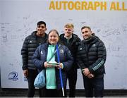 26 November 2022; Leinster players, Jordan Larmour, Tommy O'Brien and Michael Ala'alatoa with Leinster supporter Emily Gallagher at Autograph Alley before the United Rugby Championship match between Leinster and Glasgow Warriors at RDS Arena in Dublin. Photo by Tyler Miller/Sportsfile