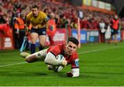 26 November 2022; Calvin Nash of Munster scores his side's first try during the United Rugby Championship match between Munster and Connacht at Thomond Park in Limerick. Photo by Piaras Ó Mídheach/Sportsfile