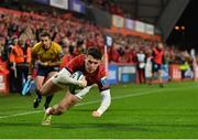 26 November 2022; Calvin Nash of Munster on his way to scoring his side's first try during the United Rugby Championship match between Munster and Connacht at Thomond Park in Limerick. Photo by Piaras Ó Mídheach/Sportsfile