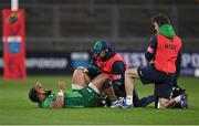 26 November 2022; Bundee Aki of Connacht receives medical attention for an injury during the United Rugby Championship match between Munster and Connacht at Thomond Park in Limerick. Photo by Piaras Ó Mídheach/Sportsfile