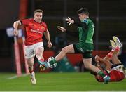 26 November 2022; Rory Scannell of Munster has his kick blocked down by Alex Wootton of Connacht during the United Rugby Championship match between Munster and Connacht at Thomond Park in Limerick. Photo by Piaras Ó Mídheach/Sportsfile