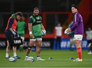 26 November 2022; Joey Carbery of Munster and Bundee Aki of Connacht during the warm-up before the United Rugby Championship match between Munster and Connacht at Thomond Park in Limerick. Photo by Piaras Ó Mídheach/Sportsfile