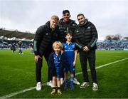 26 November 2022; Mascot Jack Forde, aged eight, with his brother Luca and Leinster players, from left, Michael Ala'alatoa, Tommy O'Brien and Jordan Larmour at the United Rugby Championship match between Leinster and Glasgow Warriors at RDS Arena in Dublin. Photo by Harry Murphy/Sportsfile