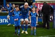 26 November 2022; Leinster captain Rhys Ruddock with mascots Eduardo McFeely and Jack Forde at the United Rugby Championship match between Leinster and Glasgow Warriors at RDS Arena in Dublin. Photo by Harry Murphy/Sportsfile