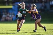 27 November 2022; Aoibhe O' Shea of Mullinahone in action against Emily Cassidy of Derrygonnelly Harps during the CurrentAccount.ie LGFA All-Ireland Intermediate Club Championship Semi-Final match between Mullinahone, Tipperary, and Derrygonnelly, Fermanagh, at John Locke Park in Callan, Kilkenny. Photo by David Fitzgerald/Sportsfile