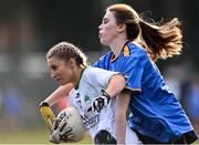 27 November 2022; Amy Gibbons of O'Dwyer's is tackled by Daisy O'Connelll of Salthill Knocknacarra during the CurrentAccount.ie LGFA All-Ireland Junior Club Championship Semi-Final match between Salthill Knocknacarra, Galway, and O’Dwyer's, Dublin, at The Prairie in Salthill, Galway. Photo by Piaras Ó Mídheach/Sportsfile