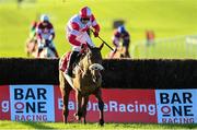 27 November 2022; The Big Dog, with Keith Donoghue up, clears the last on their way to winning the Bar One Racing Troytown Handicap Steeplechase at Navan Racecourse in Meath. Photo by Seb Daly/Sportsfile