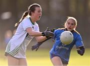 27 November 2022; Holly O'Rourke of O'Dwyer's in action against Alyssa Manley of Salthill Knocknacarra during the CurrentAccount.ie LGFA All-Ireland Junior Club Championship Semi-Final match between Salthill Knocknacarra, Galway, and O’Dwyer's, Dublin, at The Prairie in Salthill, Galway. Photo by Piaras Ó Mídheach/Sportsfile
