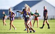 27 November 2022; Emily Cassidy of Derrygonnelly Harps in action against Aoibhe O'Shea of Mullinahone during the CurrentAccount.ie LGFA All-Ireland Intermediate Club Championship Semi-Final match between Mullinahone, Tipperary, and Derrygonnelly, Fermanagh, at John Locke Park in Callan, Kilkenny. Photo by David Fitzgerald/Sportsfile