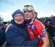 27 November 2022; Oisin Flannery of St. Thomas celebrates with supporter Jimmy Kelly after winning the Galway County Senior Hurling Championship Final Replay match between St Thomas and Loughrea at Pearse Stadium in Galway. Photo by Ray Ryan/Sportsfile